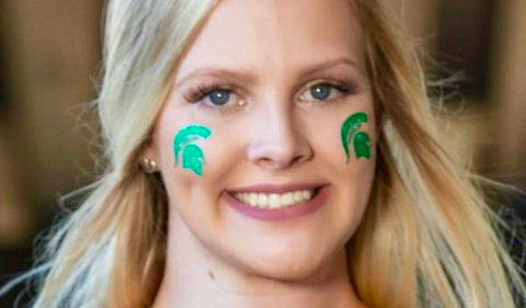  Pretty girl with Michigan State Spartan face tattoos 
